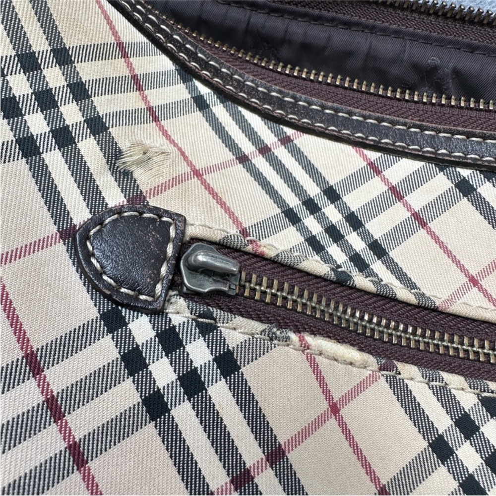 Authentic Burberry Shoulder Bag
Classic Nova check beautiful but has Flaws! - Picture 3 of 8